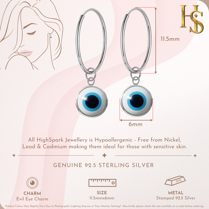 Infographic showing a pair of sterling silver hoop earrings with a dangling white and blue evil eye charm.