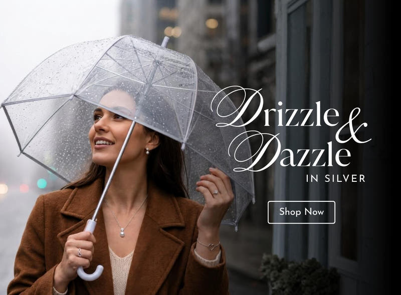 Drizzle and Dazzle in silver - monsoon jewellery collection, model with umbrella