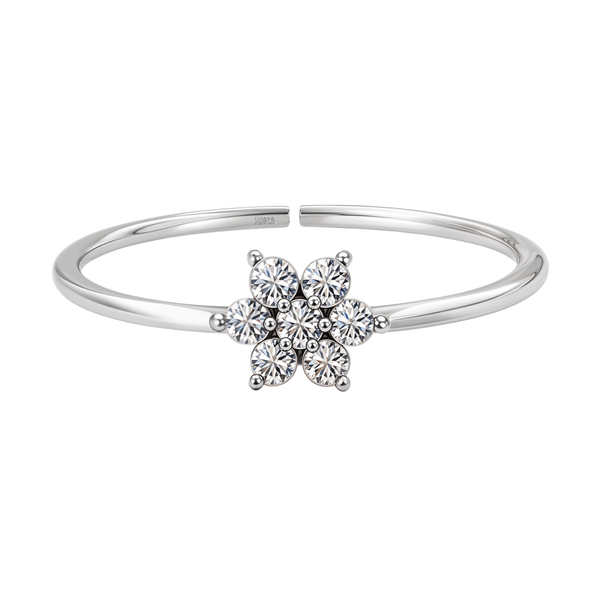 An adjustable sterling silver ring with a seven-stone American diamond floral cluster in a prong setting, shown on a white background.