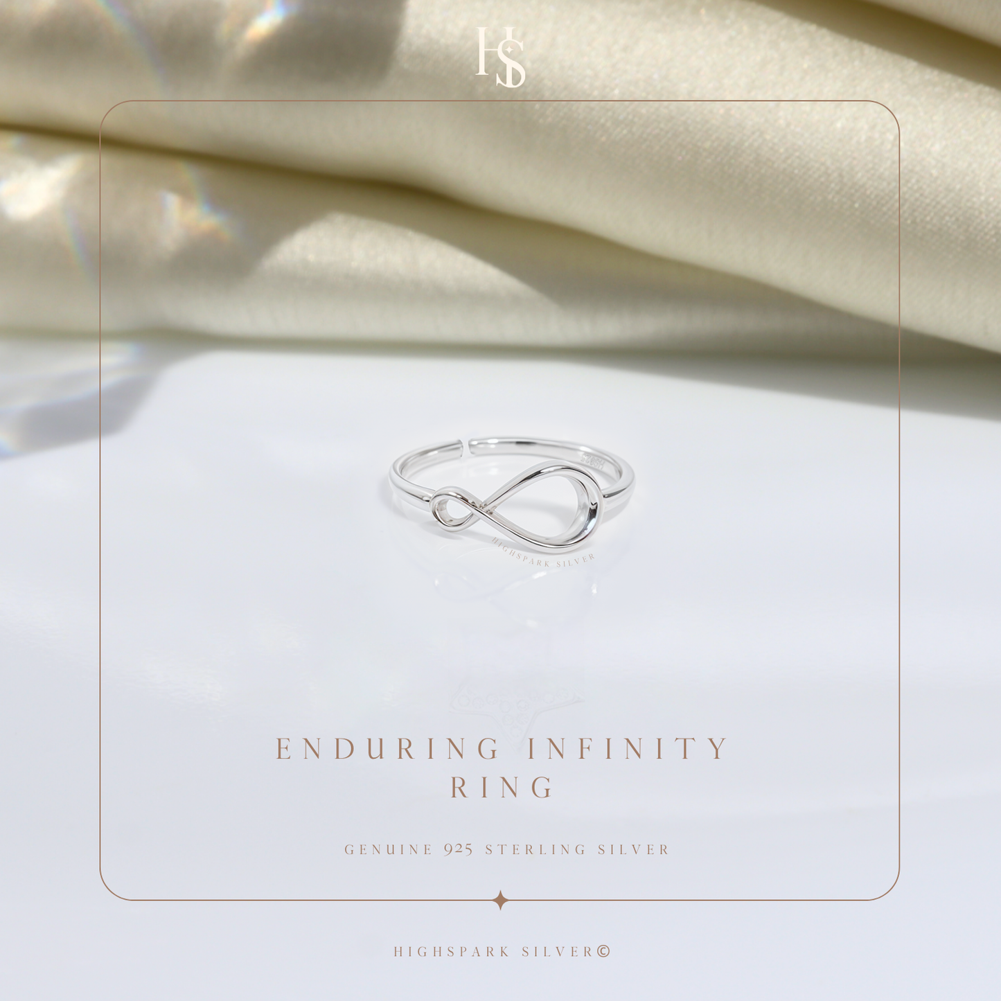 An adjustable sterling silver ring with an infinity symbol motif.