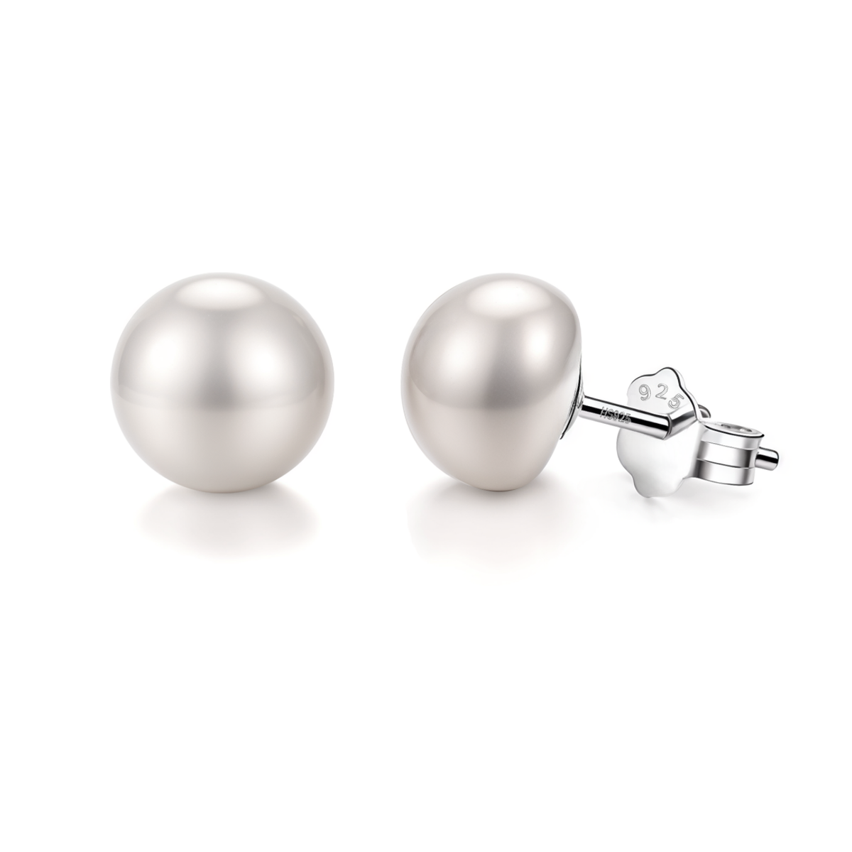 A pair of button pearl stud earrings with sterling silver posts and butterfly backs, shown on a plain white background.