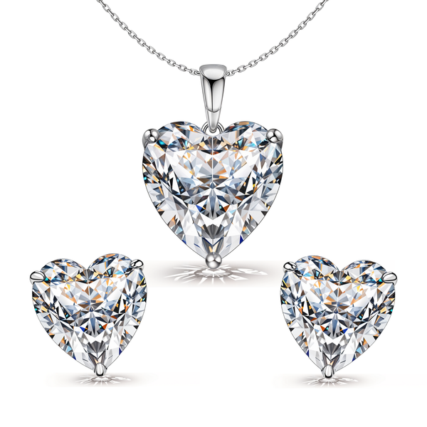 A sterling silver pendant and stud earring set with large, heart-shaped American diamonds in a three-prong setting on a white background.