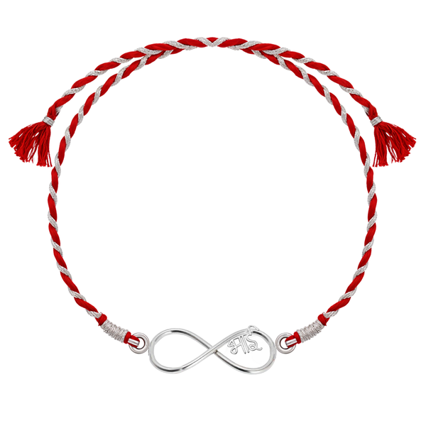 A 925 sterling silver rakhi for brother featuring an infinity knot with 'Bhai' inscribed, set on a braided red and silver thread.