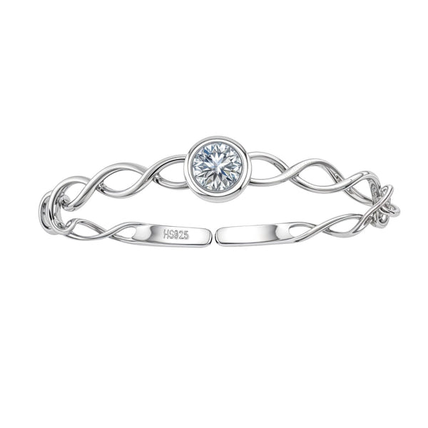 An adjustable sterling silver ring with an intertwined band and a central, bezel-set round American diamond on a white background.