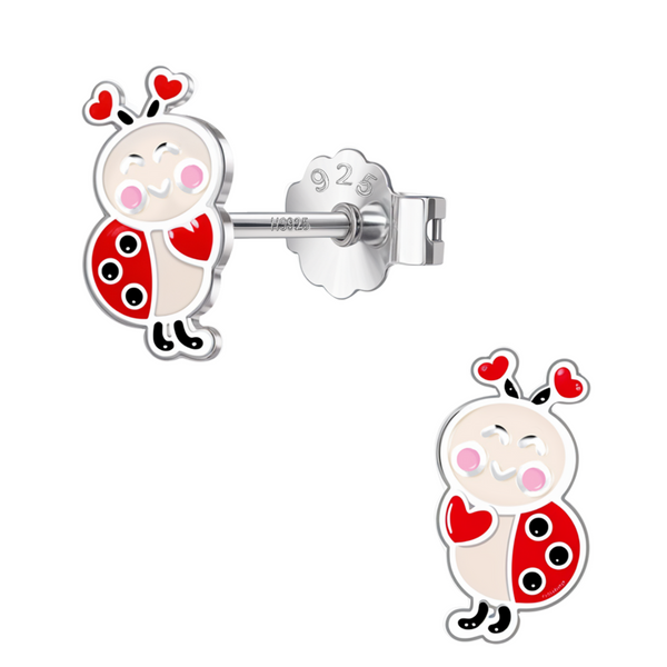 A pair of sterling silver stud earrings in the shape of a cute ladybug with red, black, and white enamel details on a white background.