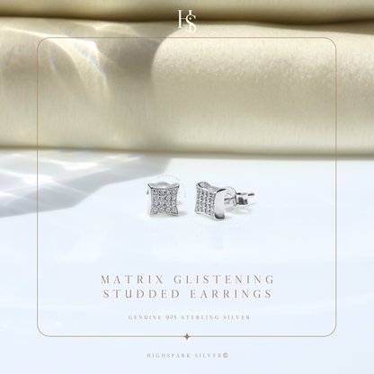 A pair of square stud earrings with pavé-set American diamonds in sterling silver.