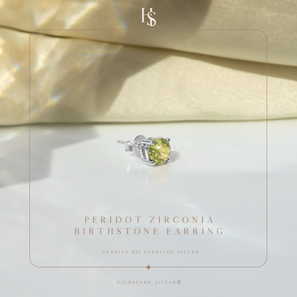 A single sterling silver stud earring with a round, peridot-green American diamond in a four-prong setting.