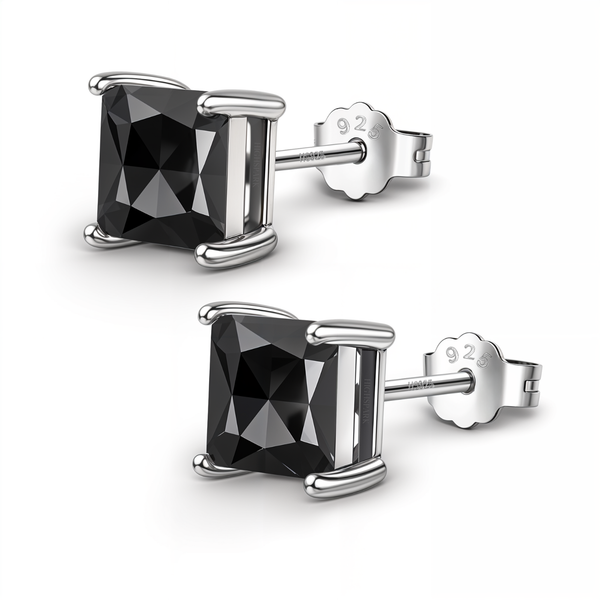 A pair of stud earrings with square-cut black stones in a four-prong sterling silver setting, shown on a white background.