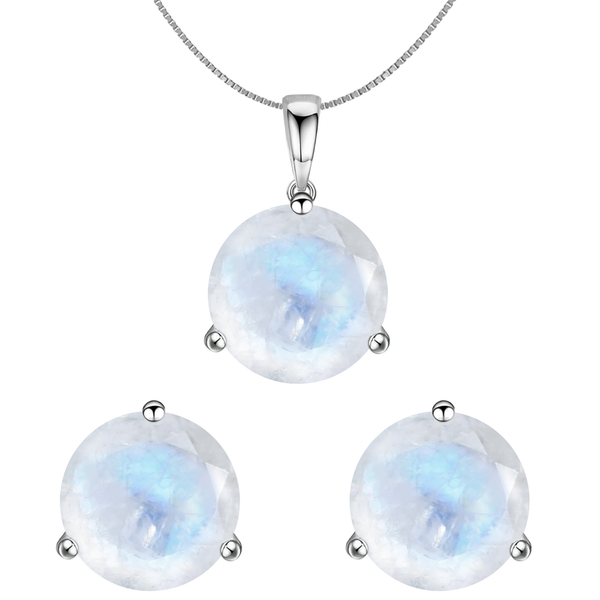 A pendant necklace and stud earrings set with round, faceted moonstones in a three-prong sterling silver setting on a plain white.