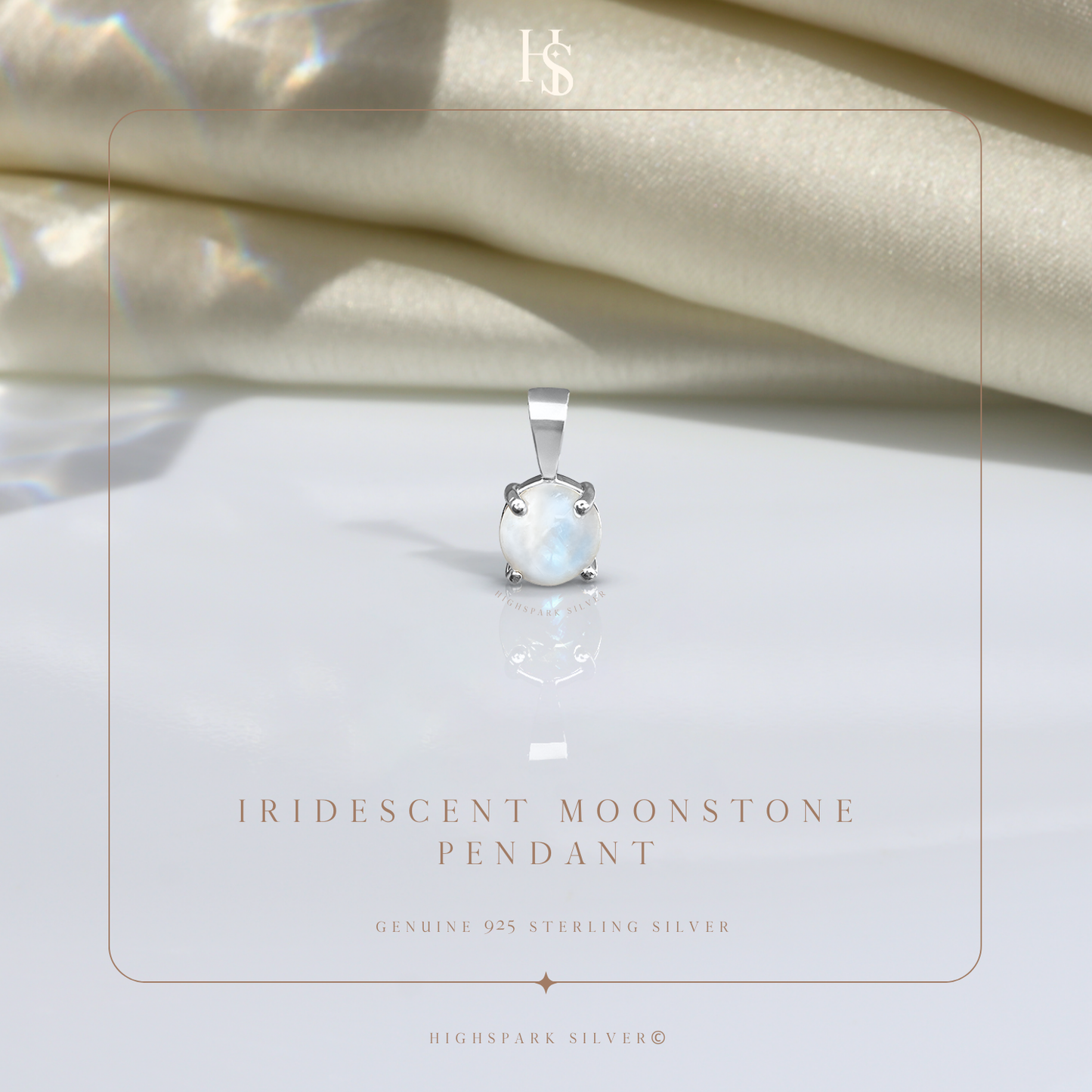 A sterling silver pendant with a round, iridescent moonstone in a four-prong setting.