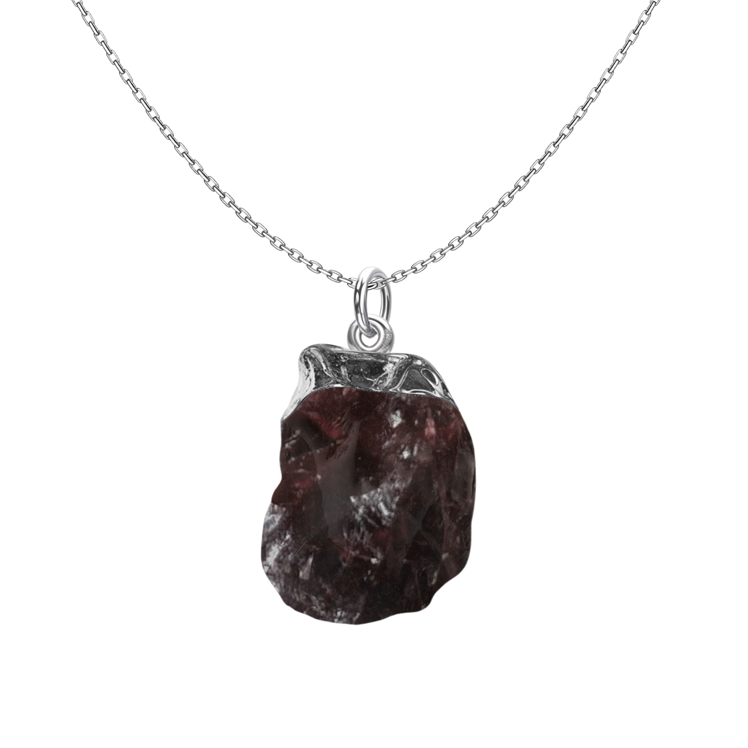 A pendant necklace with a rough-cut, natural garnet gemstone in a sterling silver setting on a plain white background.