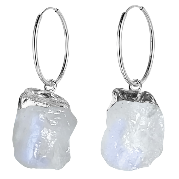 Hoop earrings with a raw, uncut moonstone charm set in a sterling silver cap, shown on a plain white background.
