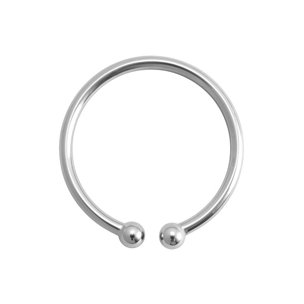 A simple, circular clip-on nose ring with two small balls at the ends, crafted in polished sterling silver and shown on a white background.