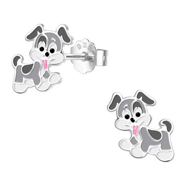 A pair of playful puppy stud earrings with grey, white, and pink enamel detailing in sterling silver, shown on a white background.