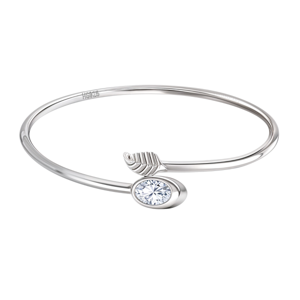 An adjustable sterling silver ring with an open bypass design featuring a bezel-set oval American diamond and a small leaf motif.