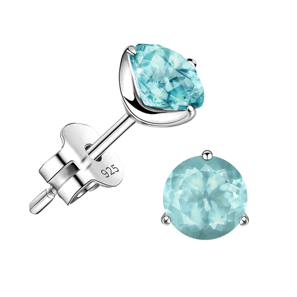 A pair of stud earrings with round, faceted aquamarine gemstones in a three-prong setting.