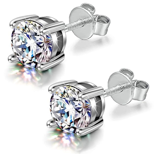 A pair of classic solitaire stud earrings with round American diamonds in a four-prong setting and secure screwbacks.
