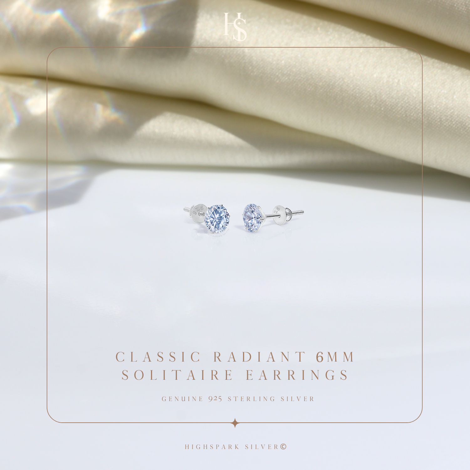 A pair of solitaire stud earrings with round American diamonds in a prong setting and screw backs.