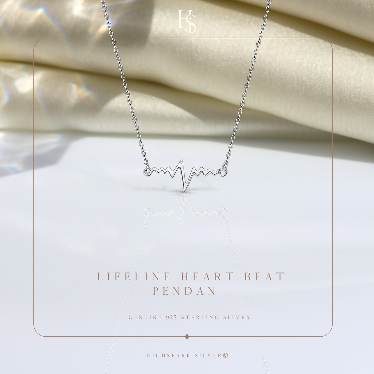 A sterling silver pendant necklace with a heartbeat or lifeline motif.