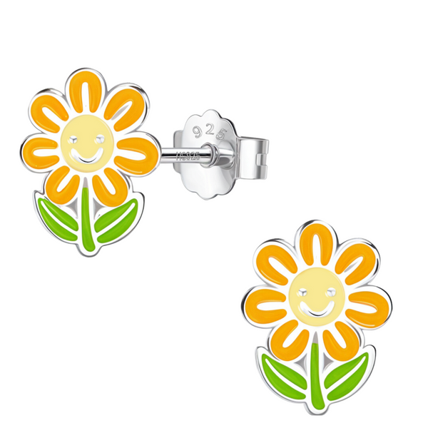 A pair of sterling silver stud earrings shaped like a smiling sunflower with yellow, orange, and green enamel, shown on a white background.