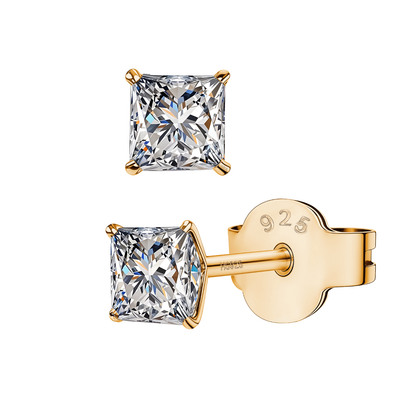 A pair of gold-plated stud earrings with a princess-cut American diamond in a four-prong setting, shown on a white background.