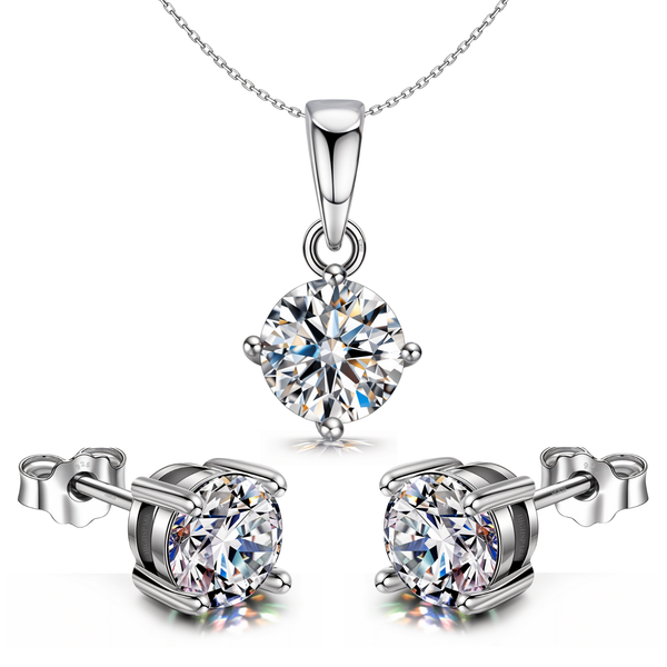 A solitaire jewellery set with a pendant necklace and matching stud earrings.