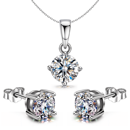 A solitaire jewellery set with a pendant necklace and matching stud earrings.