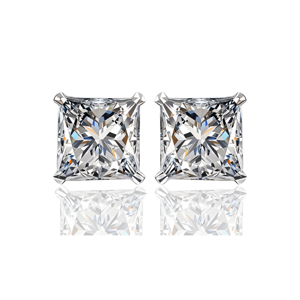 A pair of stud earrings with princess-cut American diamonds in a four-prong sterling silver setting, shown on a white reflective surface.