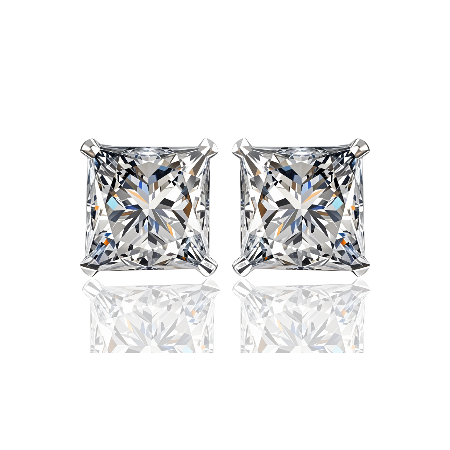 A pair of stud earrings with princess-cut American diamonds in a four-prong sterling silver setting, shown on a white reflective surface.