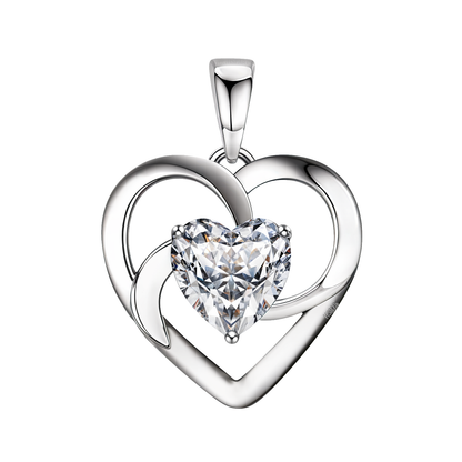 A sterling silver heart pendant with a swirling openwork frame holds a central heart-shaped American diamond in a three-prong setting.