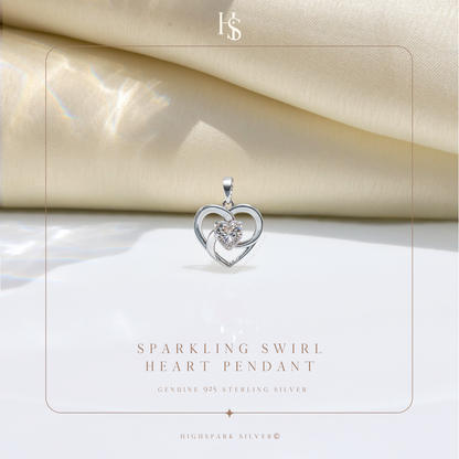 A sterling silver heart pendant with a swirling design holds a central round American diamond.