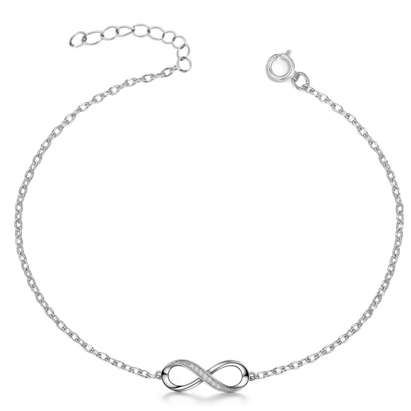 An adjustable sterling silver anklet with a central infinity symbol, partially studded with pavé-set American diamonds.