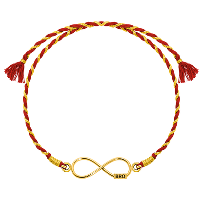 A 925 sterling silver rakhi for brother with an 18K gold finish infinity motif engraved with 'BRO' on a red and gold braided thread.