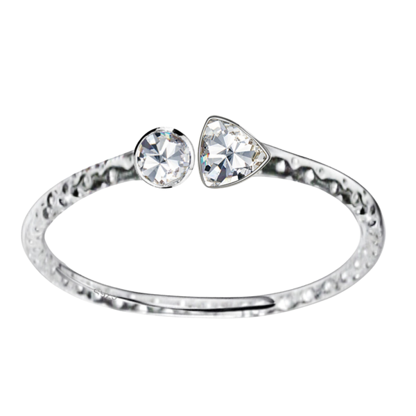 An adjustable sterling silver ring with a hammered band, featuring a round and a triangle-cut American diamond in bezel settings.