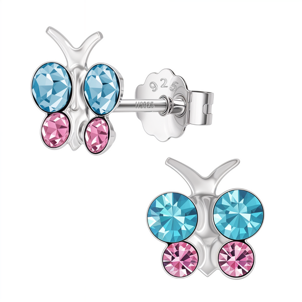 A pair of butterfly stud earrings with light blue and pink faceted stones in a sterling silver bezel setting, shown on a white background.