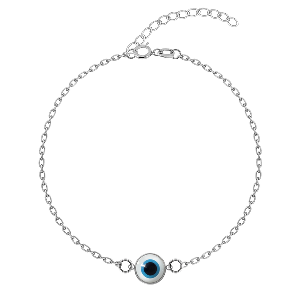 An evil eye bracelet with a central white, blue, and black charm on a sterling silver chain with an adjustable clasp, on a white background.