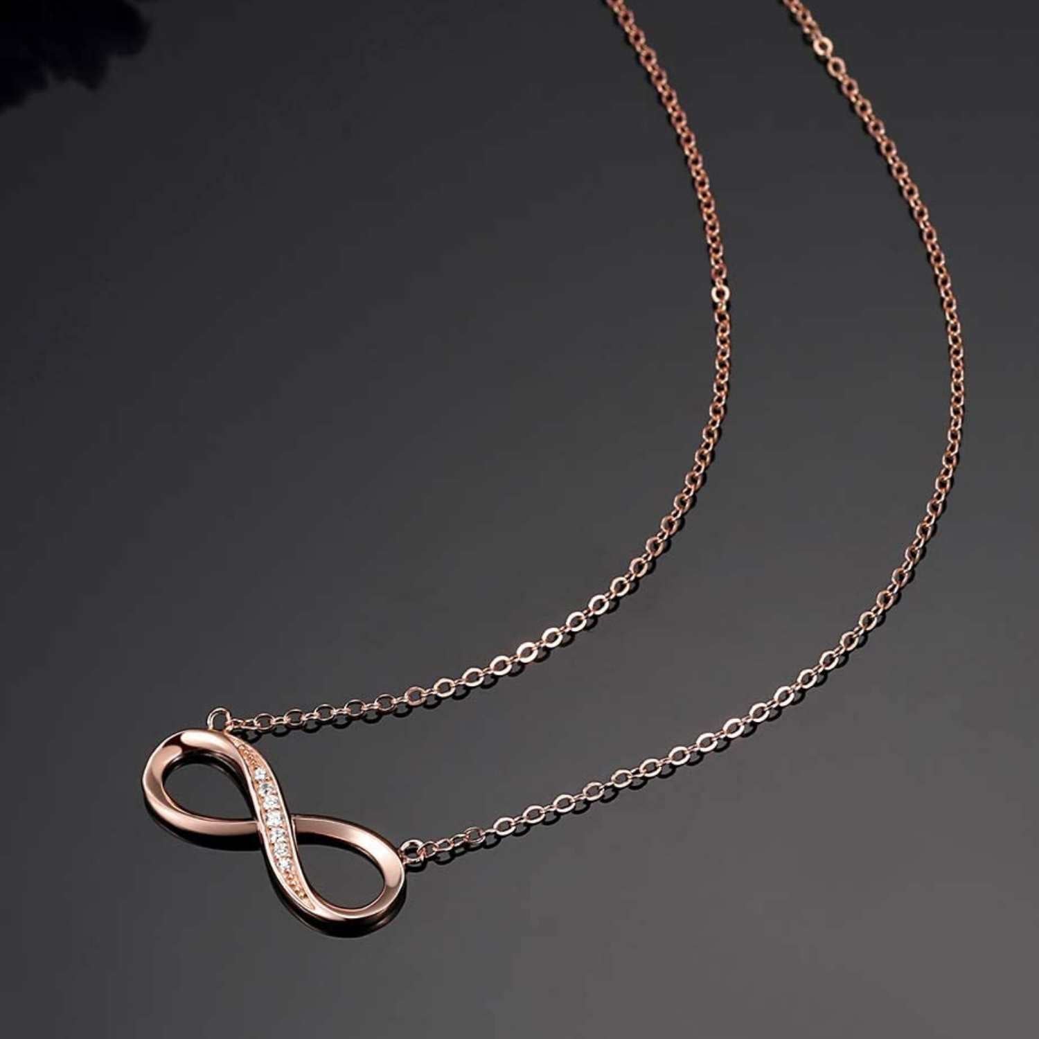 Infinity Pendant in 92.5 Silver - 18k Rose Gold finish studded with Swiss Zirconia