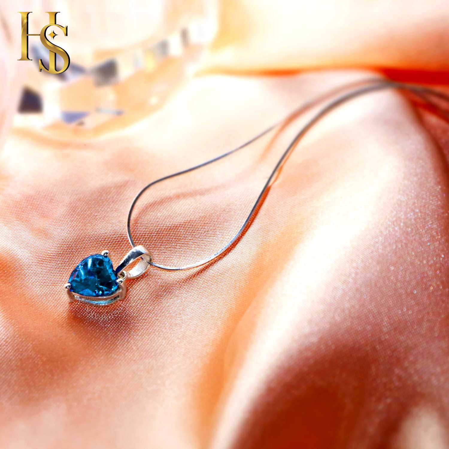 Blue Heart Solitaire Pendant with Chain in 92.5 Silver embellished with Swarovski Zirconia