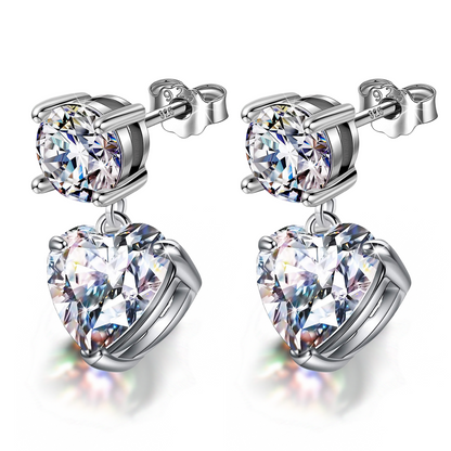 Solitaire Dangle Drop Heart Earring in 92.5 Silver embellished with Sparkling Zirconia.