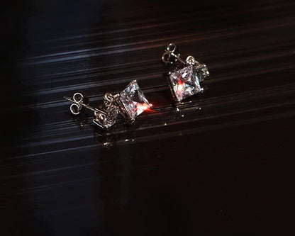 Solitaire Dangle Drop Princess Cut Square Earring embellished with Sparkling Zirconia.