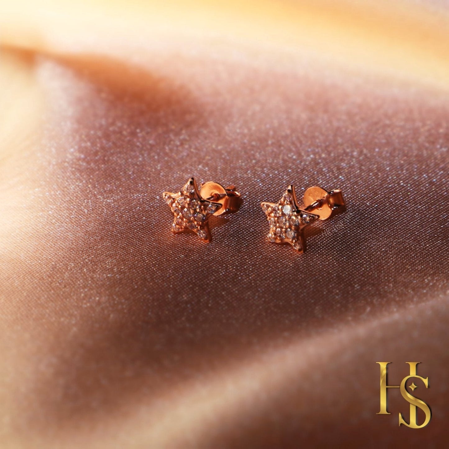Rose Gold Star Earrings in 92.5 Silver studded with Swiss Zirconia - 18K Rose Gold Finish
