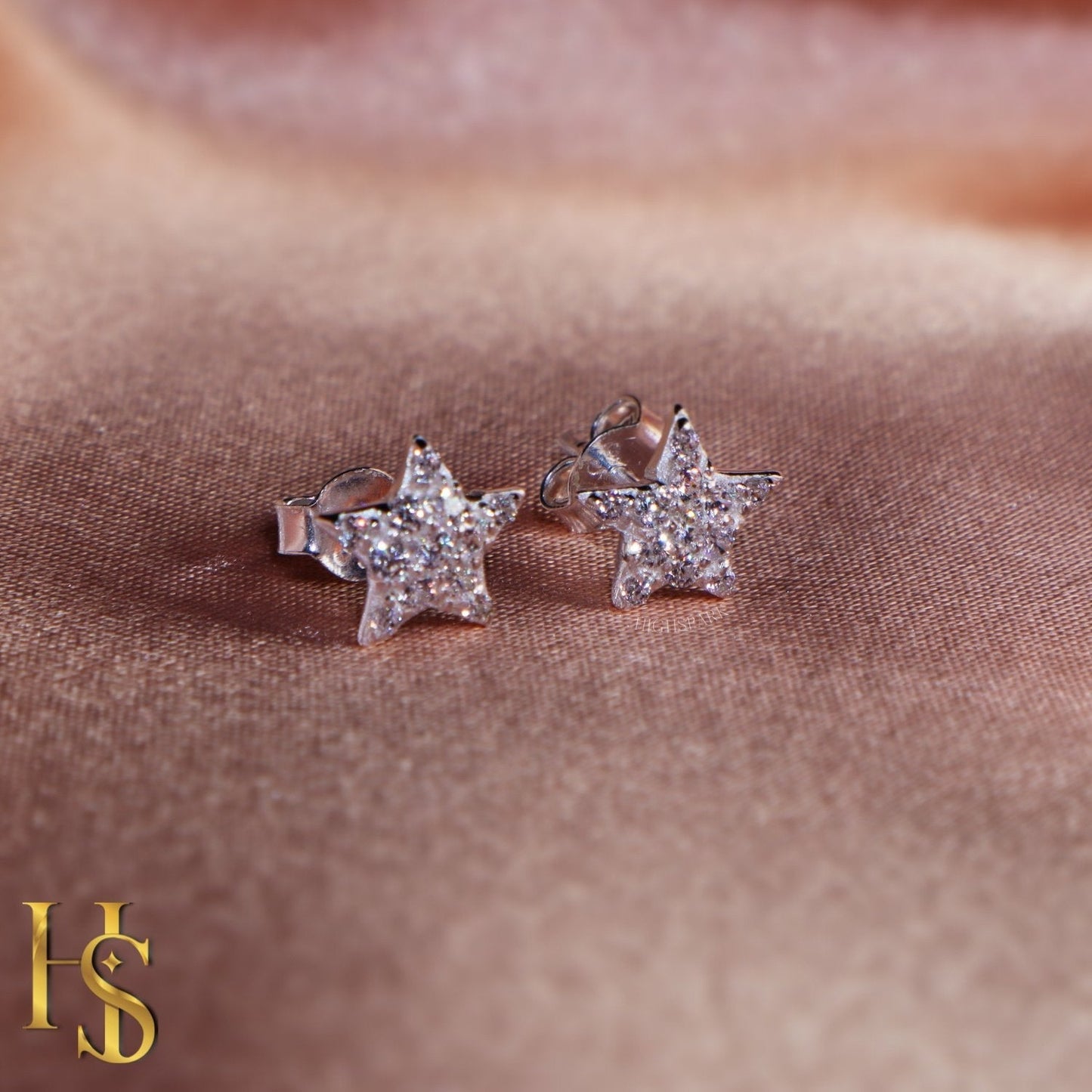 Star Earrings in 92.5 Silver studded with Swiss Zirconia