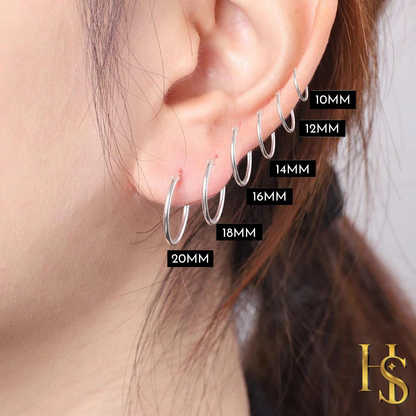 An infographic showing six sterling silver hoop earrings worn on an ear to compare sizes from 10mm to 20mm.