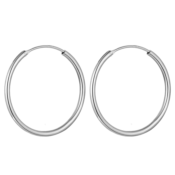 A pair of classic sterling silver hoop earrings with a polished finish shown on a plain white background.