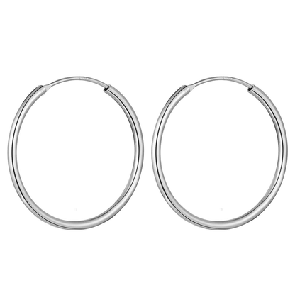 A pair of classic sterling silver hoop earrings with a polished finish shown on a plain white background.