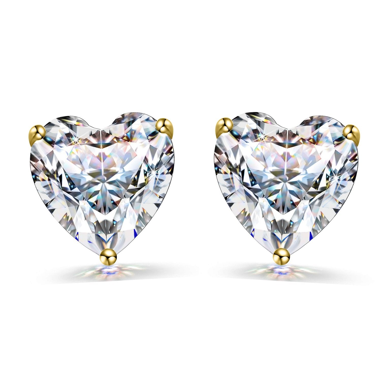 A pair of stud earrings with heart-shaped American diamond solitaires in a three-prong gold-plated setting on a white background.