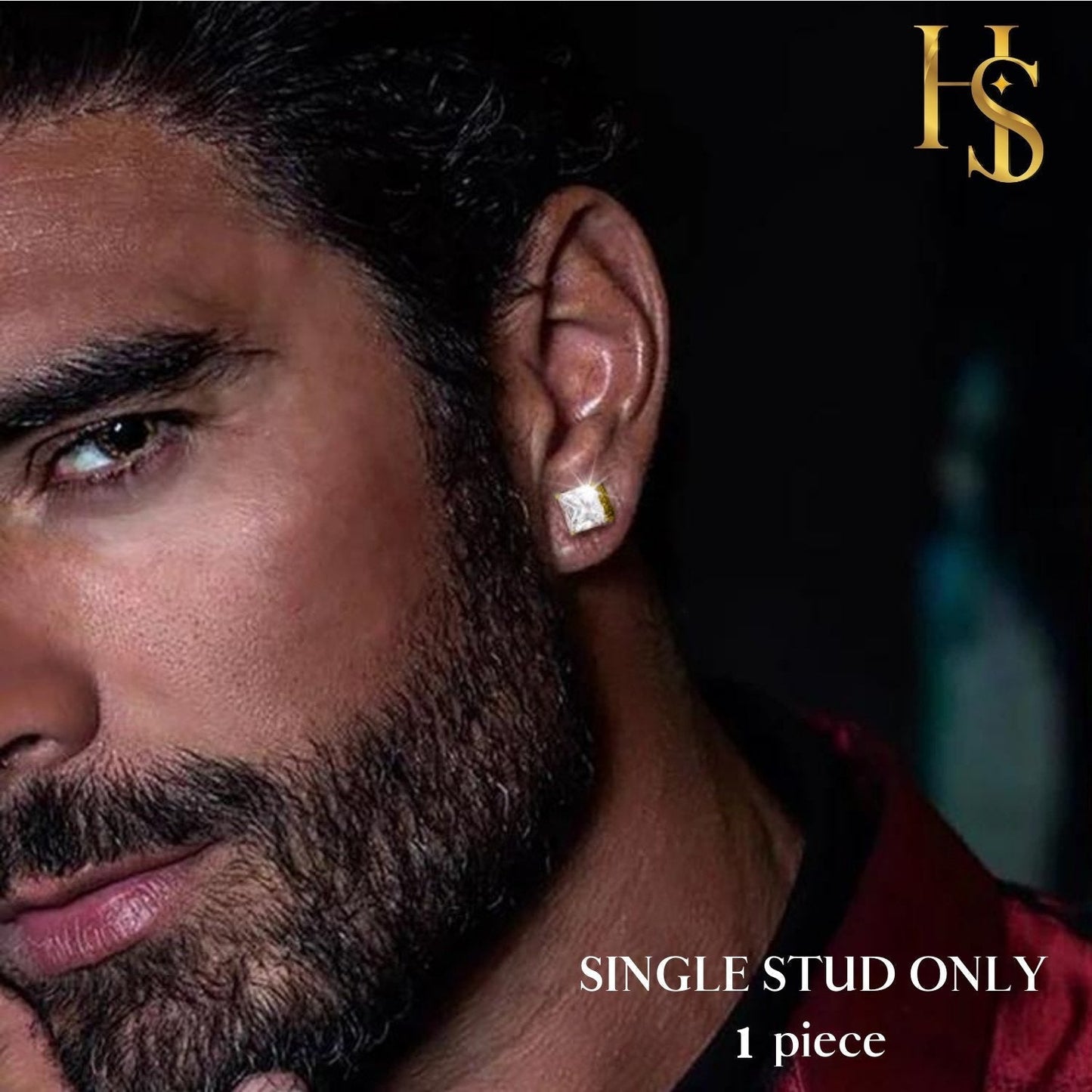 A single, square solitaire stud earring with a princess-cut American diamond in a gold-plated setting, worn on a man's ear.