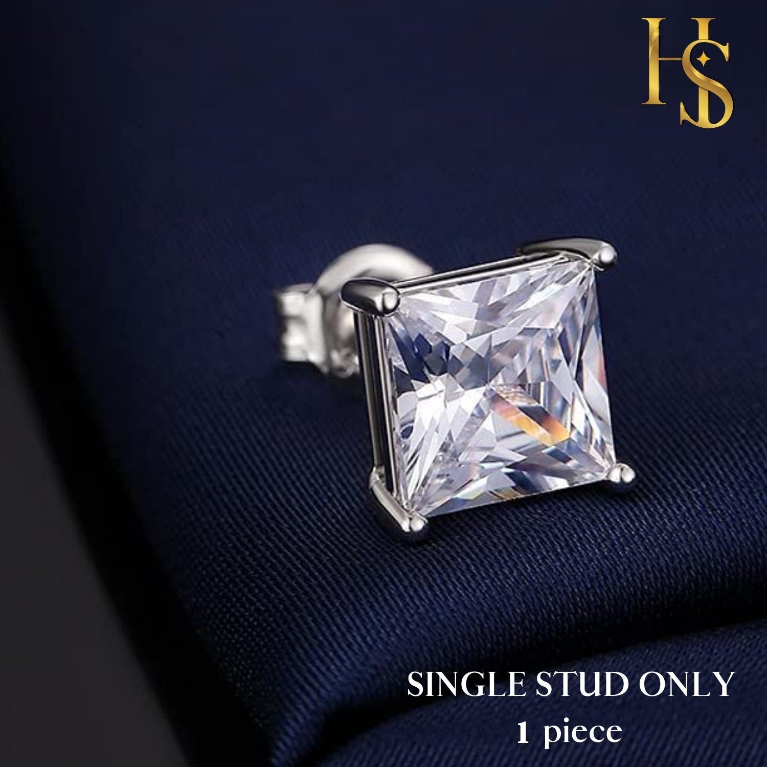 A single sterling silver stud earring with a square-cut American diamond in a four-prong setting, styled on a navy blue fabric.