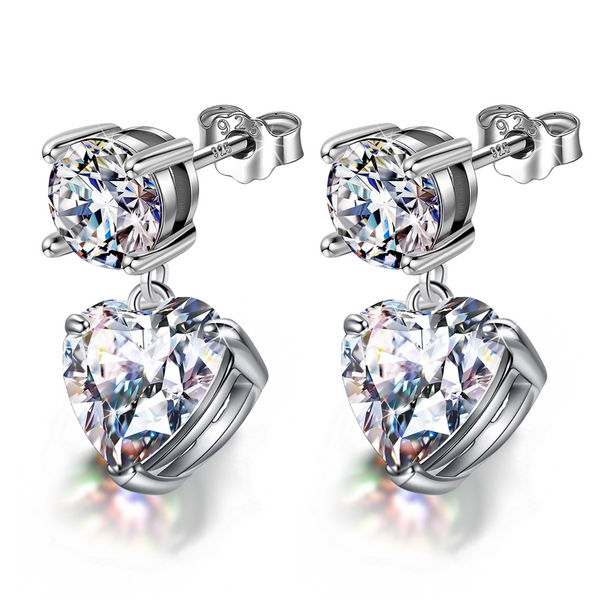 Sterling silver dangle earrings with a round American diamond stud and a heart-shaped American diamond drop, shown on a white background.